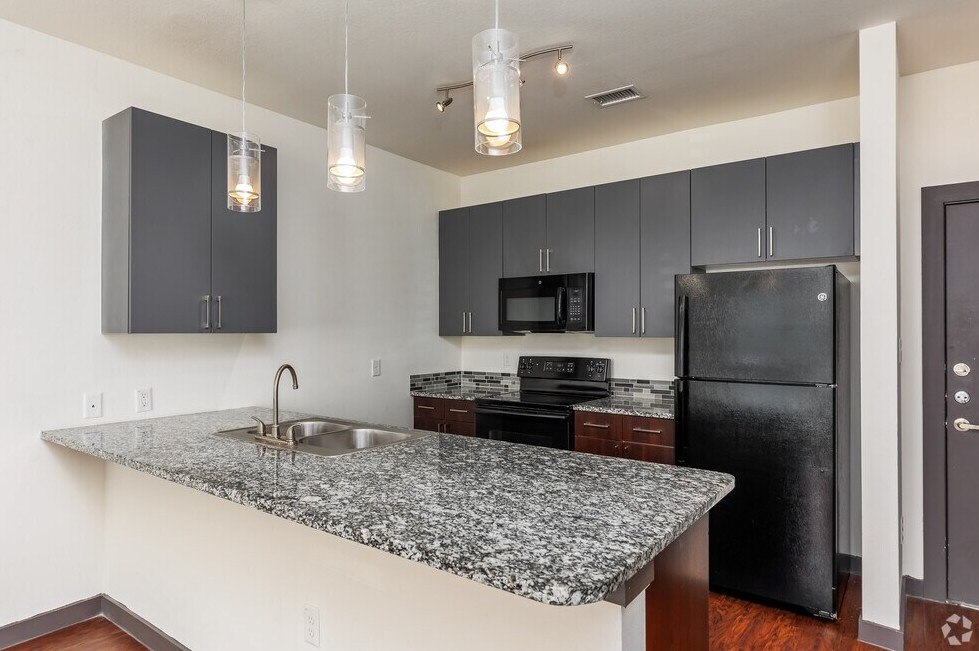 Kitchen counter at SEVEN TWELVE LOFTS Apartments, Denton, Texas